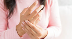 closeup shot of a woman clasping her hands