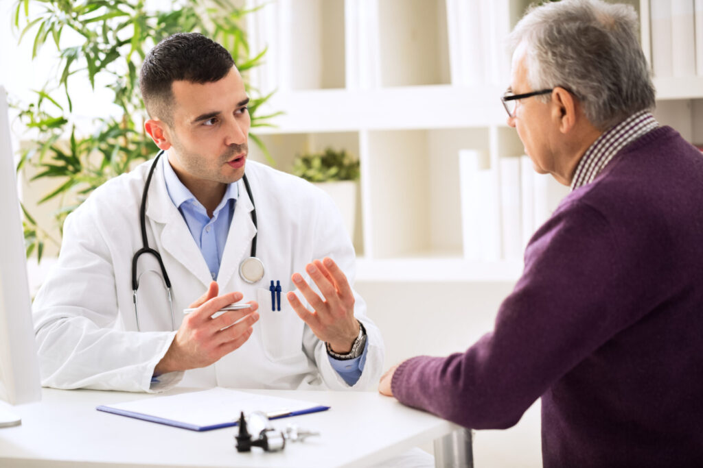 Doctor talking with patient